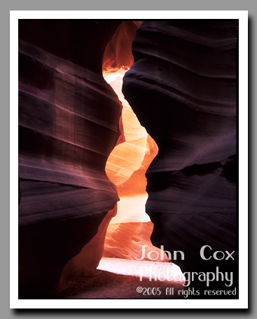 A pink wall glows through the narrows of Upper Antelope Canyon outside of Page, Arizona.